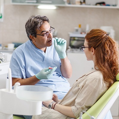 Emergency dentist in Reynoldsburg discussing with patient