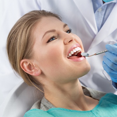 woman having a oral cancer screening